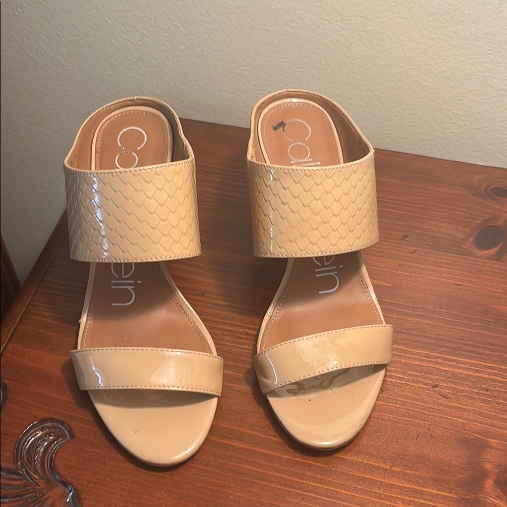 Calvin Klein Cream Mules with Minimalist Design